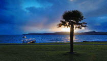 WAIKATO  SUNSET ACROSS LAKE TAUPO FROM ROUTE 1 TWO MILE BAY TOWARDS ACACIA BAY ON THE OPPOSITE SIDE OF THE LAKEAntipodean Oceania 2 One Scenic