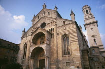 Romanesque facade of Duomo Santa Maria Matricolare and bell tower at side.  Dating from the twelth century with Romanesque portal carved by Nicolo.