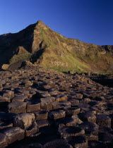 Interlocking basalt stone columns left by volcanic eruptions. View towards the south from the main section seen in golden light.