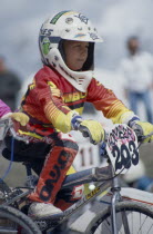 Young boy sitting on his bike ready for the start of a race