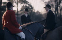 Fox hunters on horse back