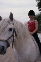 Young girl on pony