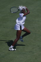 Venus Williams on court taking shot.