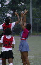 Girls playing Netball