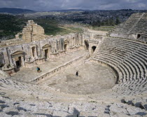 South Theatre  amphitheatre ruin from above with view of stage and seating