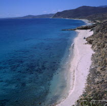 Santiago near  Los Barries. vVew over sandy beach and blue sea