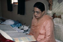 Woman leading prayer.