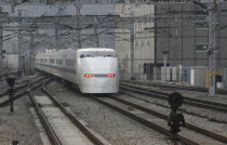 A bullet train  hikari shinkansen  arrives at Tokyo StationAsia Asian Japanese Nihon Nippon