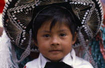 Head and shoulders portrait of young boy dressed for carnival.American Hispanic Immature Kids Latin America Latino Mexican One individual Solo Lone Solitary 1 Single unitary Young Unripe Unripened Gr...