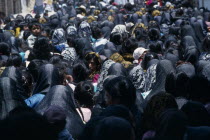 Crowds of women and children during Easter celebrations  many wearing black head coverings.American Female Woman Girl Lady Hispanic Kids Latin America Latino Mexican Religion Religious Female Women G...