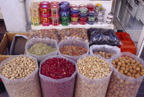 Old souq in Eastern side of the town with sacks of nuts and flower petals displayed on stall.Dubayy United Arab Emirates Al-Imarat Al-Arabiyyah Al-Muttahidah Arabic Dubai Emiriti Middle East