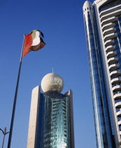 Etisalat Building on Dubai Creek with flag pole in foreground.Dubayy United Arab Emirates Al-Imarat Al-Arabiyyah Al-Muttahidah Arabic Emiriti Middle East