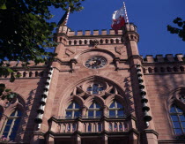 Rathaus or Town Hall exterior with carillon bells and flag fyling from roofDeutschland Western Europe European