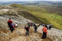 Pilgrims making their way to the top of the mountain as part of the pilgrimage.Eire European Irish Northern Europe Republic Ireland Poblacht na hireann Religion Religious