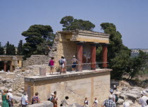 Knossos Palace ruins with tourists