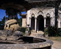 Monserrate Palace .Courtyard fountain in foreground entrance beyond