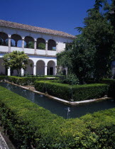 The Alhambra. Generalife Gardens. Jardin de Sultana with fountains and Generalife Palace or Summer Palace