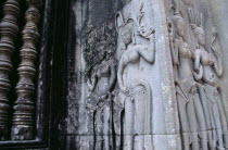 Exterior wall of the Library with relief carving of apsaras or celestial numphs.Asian Cambodian History Kampuchea Religion Southeast Asia Kamphuchea Religious