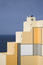 Stepped structure of seaside building with pattern of square coloured decoration