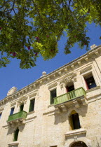 The waterfront redevelopment of old Baroque Pinto wharehouses below the bastion walls of Floriana beside the cruise ship terminal