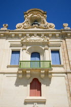 The waterfront redevelopment of old Baroque Pinto wharehouses below the bastion walls of Floriana beside the cruise ship terminal