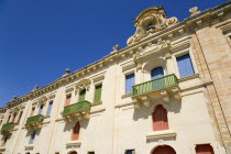 The waterfront redevelopment of old Baroque Pinto wharehouses below the bastion walls of Floriana beside the cruise ship terminal