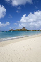 Pigeon Island National Historic Park seen from a nearby beach on a causeway to the island with yachts at anchor in Rodney BayCaribbean West Indies Windward Islands Beaches Resort Sand Sandy Scenic Se...