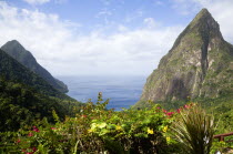 Val des Pitons The volcanic plugs of Gros Piton on the left and Petit Piton on the right with the lush valley seen from the sun deck of the Ladera Spa Resort HotelCaribbean West Indies Windward Islan...