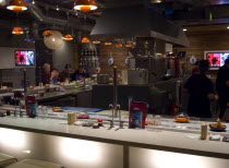 Interior of Yo Sushi bar in Jubilee Street.European Great Britain Northern Europe UK United Kingdom British Isles Inn Pub Tavern Public House