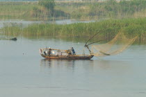 Traditional fishing boat on the Yangtze RiverAsia Asian Chinese Chungkuo Jhonggu Zhonggu Classic Classical Historical Older Scenic