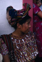 Ixil Indian girl wearing traditional dress and an elaborate head-dress wrapped into the hairAmerican Central America Classic Classical Hispanic Historical Latin America Latino Older