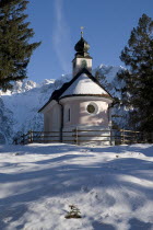 Kapelle am Lautersee. Small chapel near Lautersee lake above Mittenwald.Landscape Winter Mountains Bayern Deutschland European Religious Scenic Western Europe