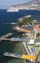 View across the harbour with cruise ship in distanceHolidays Italy Transport Beaches European Italia Italian Southern Europe Holidaymakers Resort Sand Sandy Scenic Seaside Shore Sunbather Tourism Tou...