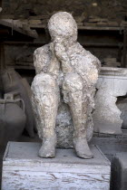 Plaster cast of the victim known as The muleteer as he uses his hands to protect his face Archaeology Romans Volcanoes Ancient Cities European Italia Italian Pompei Southern Europe History