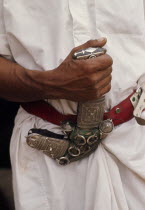 Bedouin mans hand holding his dagger Male Man Guy Middle East One individual Solo Lone Solitary Qatari