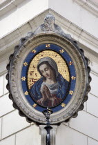 18th Century mosaic of the Madonna on the corner of a building in the Campo de Fiori the open air marketEuropean Italia Italian Roma Southern Europe Religion Religious