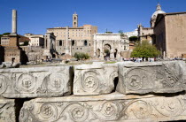 The Forum with tourists. Details of ruin fragments with the Arch of Septimius Severus in the centreEuropean Italia Italian Roma Southern Europe Center History Holidaymakers Tourism