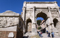 Tourists walking through the triumphal Arch of Septimius Severus in the ForumEuropean Italia Italian Roma Southern Europe Gray History Holidaymakers Tourism