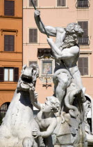 Piazza Navona The Fontana di Nettuno or Fountain of Neptune with the central figure of the sea god Neptune fighting an octopusEuropean Italia Italian Roma Southern Europe Gray History Religion