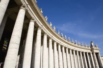 Vatican City The sweeping colonnade by Bernini topped with statues that circles Piazza San Pietro or St Peters SquareEuropean Italia Italian Roma Southern Europe Catholic Principality Citta del Vatic...