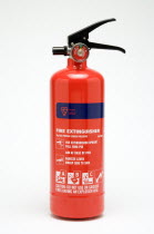 A red ABC category powder fire extinguisher on a white background with usage instructions and warnings printed on the extinguisher bodyFirefighting Precaution Security Cutout Cut Out  Firefighting P...