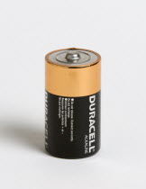 An alkaline battery on a white background