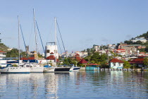 The new Peter de Savary marina development of Port Louis with the capital city of St Georges beyond.Caribbean Grenadian Greneda West Indies Grenada