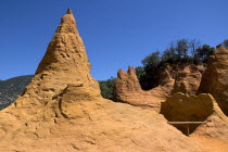 Colorado Provencal.  Cheminee de Fee or Fairy Chimneys.  General view from summit of eroded ochre rock cliff and peaks.Ochre Trail European French Western Europe