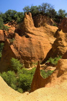 Colorado Provencal.  Cheminee de Fee or Fairy Chimneys.  Area of eroded ochre rock cliffs and pinnacles from viewpointOchre Trail European French Western Europe