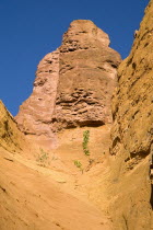 Colorado Provencal.  Cheminee de Fee or Fairy Chimneys.  View of eroded ochre rock form from the park trail.Ochre Trail European French Western Europe