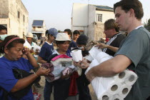 Tsunami. Thais who have been homeless receive suplies from the NGO group Family International based in the USA.. In the village of Nam Khem  where 2500 people are pressumed dead  about 125kms north of...