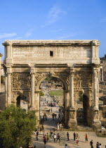 Tourists walking around the triumphal Arch of Septimus Severus in the ForumEuropean Italia Italian Roma Southern Europe History Holidaymakers Tourism