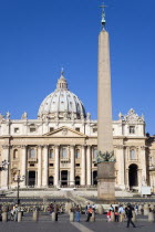 Vatican City St Peters Square with tourists and the facade of St Peters Basilica beyond the obeliskEuropean Italia Italian Roma Southern Europe Catholic Principality Citta del Vaticano History Holida...