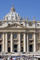 Vatican City The central facade of the Basilica of Saint Peter with crowds gathered in the Piazza San Pietro during an audinece before Pope Benedict XVIEuropean Italia Italian Roma Southern Europe Ca...